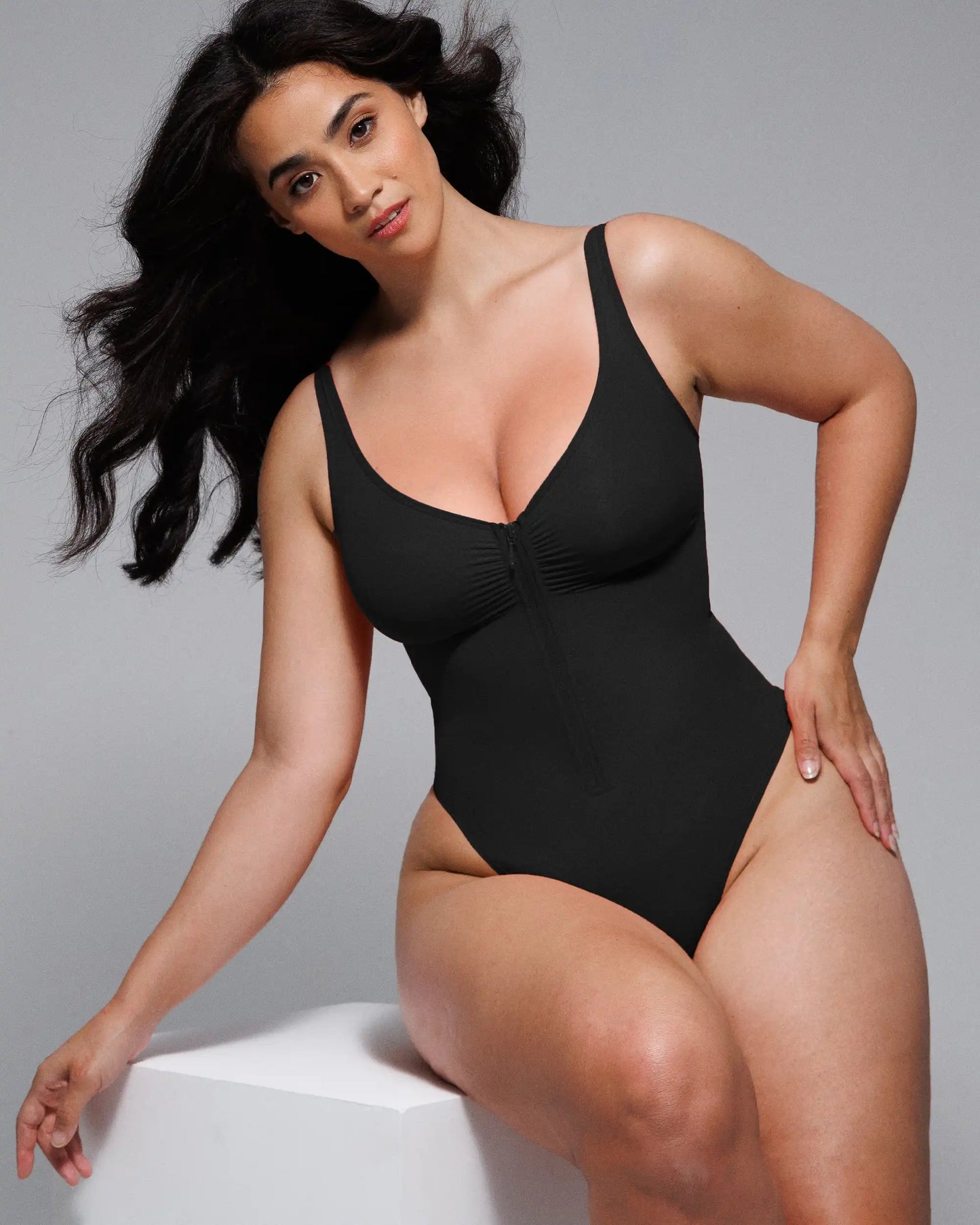 Bare Essentials™ Skin Flow Zipper Front Thong Bodysuit