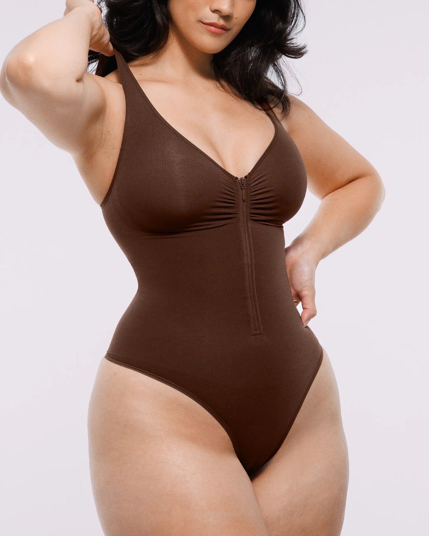 Bare Essentials™ Skin Flow Zipper Front Thong Bodysuit